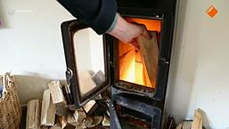 Houtrook: gezellig vuur, zieke buur